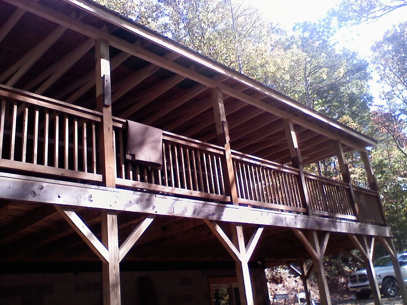 Timber framing under a new elevated porch and deck — Roof Leak Repair in Minooka by Roofing Brothers